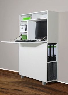 an office desk with a computer on it