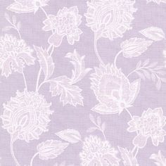 a purple and white flower pattern on fabric