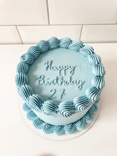 a blue birthday cake with the words happy birthday 24 on it's frosting