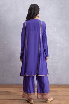 Amethsyt purple kurta highlighted with embroidery, embellishments, notched neckline and full sleeves. Comes with pant.
Components:2
Embroidered
Neckline:Notched
Sleeve Length:Full
Fabric:Kurta: Original Silk Crepe, Pure Cotton Silk; Pant: Handwoven Chanderi, Pure Cotton Silk, Cotton Voile
Color:Purple
Straight kurta
Embroidered pant - Aza Fashions Designer Embroidered Purple Salwar Kameez, Bollywood Purple Palazzo Set With Resham Embroidery, Purple Bollywood Palazzo Set With Resham Embroidery, Designer Bollywood Style Purple Palazzo Set, Bollywood Style Designer Purple Palazzo Set, Festive Purple Palazzo Set With Zari Work, Purple Bollywood Designer Wear Palazzo Set, Designer Long Sleeve Purple Palazzo Set, Festive Purple Palazzo Set With Long Sleeves