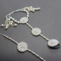 Beautiful White Pearl Sequin Beaded Hath Phool & Bracelet Bhaiya Bhabhi Rakhi Designed with the heart, this beautiful rakhi are made of premium material. Embroidered art work. Rakhi 2 Pcs Set. Rakhi For Bhaiya Bhabhi( tie loop, lumba) Rakhi For Brother, Rakhi Gifts, Rakhi, Rakhi, Brother Latest Rakhi, Designer Rakhi, Send Online Rakhi To Brother We welcome wholesale quires and all feedback. Bhaiya Bhabhi Rakhi Design, Adjustable Anklets With Latkans For Festive Occasions, Adjustable Festive Anklets With Latkans, Beads Rakhi Designs, White Spiritual Tilla Jewelry, Spiritual White Tilla Jewelry, Beaded Jewelry For Navratri Wedding, Beaded Jewelry For Wedding And Navratri, Traditional Anklets With Round Beads