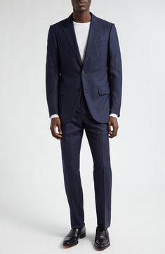 Incredibly high-thread-count wool—named for the Italian word for 120,000—lends a luxurious feel to this impeccable suit patterned with subtle stripes. Meticulous pickstitching showcases the label's scrupulous attention to detail. Jacket has notched lapels; chest welt pocket; front flap pockets Trousers have zip fly with hook-and-bar closure; front slant pockets; back welt pockets 100% wool Dry clean Made in Italy Designer Clothing Designer Tailored Suits With Suit Collar, Luxury Suits With Welt Pockets, Tailored Luxury Wool Suit, Luxury Tailored Wool Suit, Timeless Wool Suits With Structured Boning, Luxury Tailored Wool Three-piece Suit, Luxury Wool Formal Sets, Designer Wool Suits For Business, Designer Wool Suits For Semi-formal Occasions