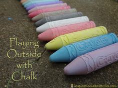 some crayons are lined up in a row with the words playing outside with chalk written on them