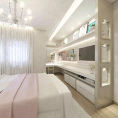 an image of a bedroom with white furniture and chandelier hanging from the ceiling