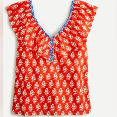 J. Crew Ruffle V-Neck Top In Classic Block Print. Size Xs, New With Tags. With A Fluttery Ruffled Neckline, A Bright Block Print And A Poppy Contrasting Trim, This Top Brings The Good Kinda Drama! 100% Cotton, Lined. Body Length 25”. Chic Red Flutter Sleeve Top, Red V-neck Summer Blouse, Red Ruffled Top For Beach, Red Ruffled Tops For Vacation, Red Ruffled Beach Blouse, Red Ruffled Blouse For The Beach, Vacation Ruffle Red Blouse, Red Ruffled Blouse For Vacation, Sleeveless Button Down Shirt