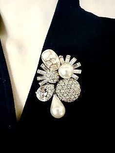 https://jewelrysalehub.com It is quality US made and is hallmarked Marvella. Fabulous as bridal jewelry. Prices were high end. Brooch is in very good and gently used condition with minor age appropriate wear or soiling to the baroque pearl. Glamorous Formal Brooches With Bling, Glamorous Formal Brooches With Rhinestones, Elegant Rhinestone Brooch For Party, Elegant Party Brooches With Bling, Elegant Embellished Evening Brooch, Victorian Jeweled Brooches For Party, Luxury Rhinestone Brooch For Formal Occasions, Luxury Rhinestone Brooches For Formal Occasions, Designer Party Brooch Jewelry