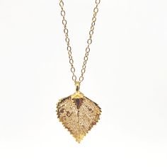 The pendant for this piece is a vintage leaf that replicates nature. The design allows the viewer to see the detail of a real leafs pattern. They were primarily made in the 70's and are very nostalgic. The pendant is dangling from a textured 18" gold plated chain with a gold filled clasp. I can always adjust the necklace to any desired length. Pearl Flower, Leaf Necklace, Gold Plated Chains, Flower Necklace, Gold Filled, Gold Plate, I Can, Chain, Pendant