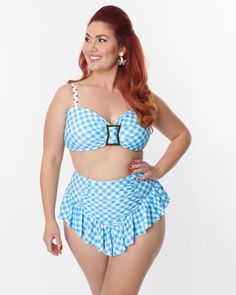 This is the perfect swim top for your summer days! The blue and white gingham pattern with a unique faux buckle accent is stylish and fun. It's also comfortable, featuring padding, a self tie back and removable white straps with adorable red polka dots. Plus, it comes in sizes XS-3X while supplies last – don't miss out! Soak up the sun in this plus-size bikini top from our extended size swimwear collection. Unique Vintage Unique Vintage Blue Gingham Buckle Swim Top | Blue, Gingham | Swimsuits | Materials & Care Instructions: ['95% Polyester, 5% Spandex', 'Hand wash', 'Imported'] Cheap Gingham Swimwear For Swimming, Cheap Gingham Swimwear For Beach, Affordable Gingham Casual Swimwear, Cheap Gingham Beachwear Swimwear, Cheap Gingham Swimwear For Poolside, Preppy Swimwear, Gingham Swimsuit, Unique Swimsuits, Blue And White Gingham