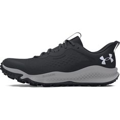 the under armour men's shoes are black and grey with white accents on the upper part