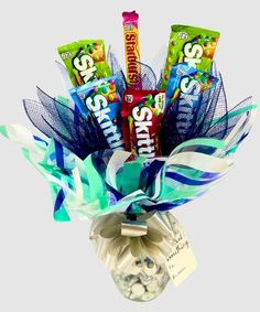 a vase filled with assorted candy and candies