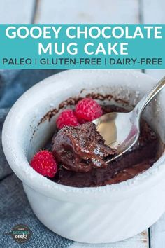 chocolate mug cake with raspberries in it and text overlay that reads, gooey chocolate mug cake palen - gluten - free / dairy - free