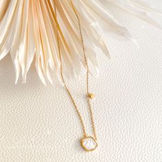 Go ahead and make a statement without saying a word with this cute and dainty Snow Shell Necklace! The tiny heart charm attached gives the necklace that subtle elegance. Material: 18k gold plated on stainless steel Pendant: Natural cowrie shell Length: White Dainty Shell Necklace As A Gift, Dainty White Shell Necklace For Gift, Dainty White Shell Necklace For Gifting, Elegant Gold Plated Shell Necklace As Gift, Dainty Shell Necklace With Pearl Charm, White Minimalist Gold-plated Charm Necklaces, Dainty White Tarnish Resistant Charm Necklace, Dainty Gold Mother Of Pearl Necklace, Gold Shell Necklace With Delicate Chain As Gift