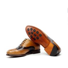 Also known as a wingtip, the Full Brogue is easily identifiable as one of the most classic pairs of men's dress shoes on the market. Featuring a brogue pattern along the sides as well as the toe cap, every man needs a Full Brogue in his shoe closet. Sole units (different available) are Blake stitched to uppers. Upper Materials: croco brown + cognac painted calf Lining: brown calf leather Sole: leather sole + buttons rubber injections Last: Zurigo - Rounded Toe for Traditional English Look All th Jodhpur Boots, Men's Dress Shoes, Brown Oxfords, Traditional English, Leather Box, Oxford Dress, Red Sole, Shoe Closet, Every Man