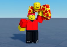 a lego man holding up a large piece of pizza on his head and wearing a red shirt