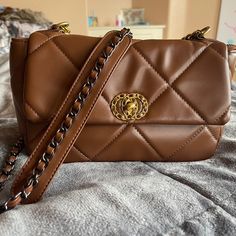 Gorgeous Vegan Leather Handbag Made To Look Similar To A Chanel 19. A Fun Little Upgrade To Any Outfit. Well Crafted And Never Worn. It’s A Deep Carmel Brown Color And Has A Burgundy Interior With Multiple Highly Functional Pockets. Two Colored Chain Detail Finishes Off This Darling Handbag. Everyday Brown Flap Bag With Chain Strap, Brown Satchel With Chain Strap For Everyday, Everyday Brown Satchel With Chain Strap, Trendy Brown Flap Bag With Gold-tone Hardware, Trendy Camel Shoulder Bag, Trendy Camel Satchel, Travel Flap Bag With Chain Strap In Brown, Brown Shopping Bag With Chain Strap, Brown Flap Clutch Bag For Shopping