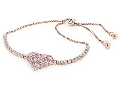 Bella Luce ® pink and white diamond simulants 3.71ctw round and baguette, Eterno™ 18k rose gold over sterling silver heart adjustable bracelet. Measures approximately up to 9"L x 0.56"W and has a bolo closure. The diamond equivalent weight is 1.94ctw. Rose Gold Bracelets With Pave Setting For Gift, Rose Gold Cubic Zirconia Jewelry With Baguette Diamonds, Rose Gold Baguette Diamond Jewelry In Cubic Zirconia, Valentine's Day Pink Gold Jewelry With Cubic Zirconia, Valentine's Day Pink Gold Cubic Zirconia Jewelry, Rose Gold Bracelet With Baguette Diamonds As Gift, Rose Gold Baguette Diamond Bracelet As A Gift, Rose Gold Jewelry With Diamond Accents For Valentine's Day, Valentine's Day Rose Gold Jewelry With Diamond Accents