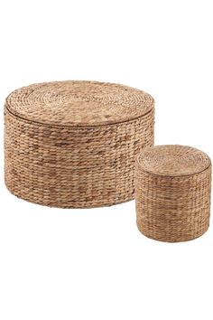 two round wicker baskets sitting next to each other on top of a white background