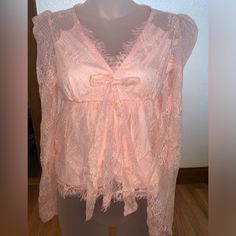 Women's Size Xs!! New With Tags Baby Pink/Lace! This Comes From A Pet Friendly/Pet Loving Home Fyi. Photos Are Taken With & Without Flash! I Have Many More Items For Sale On My Page! Fyi - Non-Serious Inquiries & Unreasonable Offers Will Be Permanently Blocked! Cute V-neck Top With Lace Trim, Pink Lace Top With Ruffles, Pink Ruffled Lace Top, Cute Spring Party Blouse, Cute Lace Trim Top, Cute Long Sleeve Party Tops, Pink Lace Top With Ruffles For Spring, Cute Long Sleeve Tops For Party, Cute Long Sleeve Party Blouse