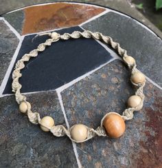 "Please read below for sizing and item details.  Note that these pieces are sized by the inner FIT not length. To ensure a proper fit always measure yourself either around the wrist/neck/ankle.  Natural hemp can be scratchy and fibrous when new, as you wear your jewelry it will soften over time. Always remove before bathing or swimming to increase longevity of your jewelry.  Beaded hemp necklace.  Fit - 16\" Width - 1/2\" Style - spiral Hemp strands- 2mm natural  Embellishments - wooden beads  C Cowrie Shell Necklace, Jewelry Hippie, Hemp Necklace, Hemp Jewelry, Hemp Bracelets, Dragonfly Jewelry, Button Bracelet, Hippie Bracelets, Jewelry Summer