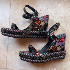 Like New Christian Louboutin Worn Twice No Box Size 38 Multicolor Closed Toe Wedge Sandals For Party, Multicolor Wedge Heels For Party, Designer Black Wedge Sandals For Party, Multicolor Wedge Heel Sandals For Party, Designer Wedge Sandals For Party, Party Multicolor Wedge Heel Sandals, Party Multicolor Wedge Sandals, Wedge Shoe, Womens Shoes Wedges