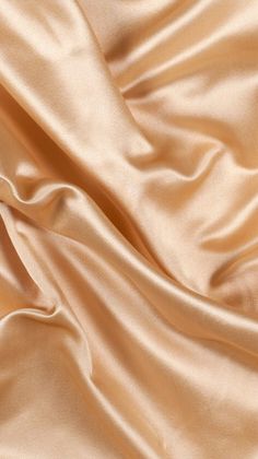 a close up view of a tan satin fabric