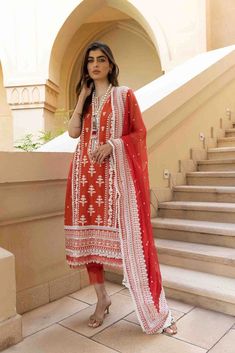 Traditional Red Salwar Kameez for Pakistani Eid Dress is a magnificent Pakistani Fancy Dress with lavish yet graceful decorations on it. This Pakistani Eid Dress seems to be a very classy choice with floral embroidered patterns accompanied by white thread work to style on any special event or party. Red Salwar Kameez, Floral Lawn, Border Mirror, Mirror Lace, Sobia Nazir, Pakistani Women Dresses, Pakistani Party Wear, Pakistani Fancy Dresses, Eid Dresses