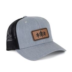 Description: Looking for a stylish and functional trucker hat? Look no further! This hat is made from high-quality materials and features a mesh back for breathability. The TriPine Leather Patch Trucker Hat is also adjustable, so you can find the perfect fit. Each leather patch is unique and may have natural blemishes. Snapback Hat With Mesh Back For Outdoor Activities, Breathable Adjustable Trucker Hat For Outdoor Activities, Breathable Adjustable Trucker Hat For Outdoor, Adjustable Mesh Snapback Hat For Outdoor, Adjustable Outdoor Hat With Mesh Back, Mesh Cap For Outdoor Activities, Adjustable Mesh Back Hat For Outdoor, Gray Snapback Hat With Flat Bill For Outdoor, Gray Baseball Cap Snapback For Outdoor