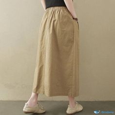 Orcajump - Long Textured Skirt for Women with Comfortable Fit Spring Casual Ankle-length Maxi Skirt, Spring Ankle-length Casual Maxi Skirt, Baggy Spring Midi Skirt, Casual Non-stretch Skirt With Pockets, Ankle-length Solid Lined Skirt, Solid Color Baggy Long Skirt, Solid Ankle-length Lined Skirt, Solid Color Ankle-length Lined Skirt, Casual High Waist Non-stretch Skirt