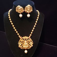 "Handmade Indian Temple Jewelry, best to wear it for traditional ceremonies or Indian wedding. This bridal jewelry has ethnic finish. It has Cubic Zircon stones with ruby and emeralds. It is a Bollywood style one gram jewelry. There are long and short patterns of Indian jewelry in Kundan, Pearls, CZ, American Diamond , ruby, emerald, Polki, kemp to suit every occasion of South Indian and North Indian weddings. Handmade Indian Jewelry item * Stunning Hand made Temple jewelry set. * Necklace Set i Spiritual Kundan Necklace For Ceremonial Occasions, Gold Jewelry With Peacock Design For Rituals, Gold Kundan Mala For Spiritual Use, Gold Bridal Necklace With Peacock Design For Rituals, Spiritual Gold Kundan Mala, Spiritual Kundan Mala In Gold, Kundan Jhumkas With Peacock Design For Puja, Bollywood Style Peacock Design Necklaces For Rituals, Ceremonial Temple Jewelry Sets With Latkans