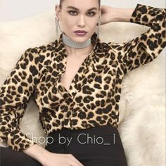 Satin Effect Shirt Leopard Print Shirt With V-Neck Lapel Collar And Long Sleeves With Cuffs . Front Button Closure .Leopard Outer Shell 100% Polyester Elegant Brown V-neck Blouse, Chic Brown Shirt For Workwear, Chic Brown Shirt For Work, Casual V-neck Shirt For Night Out, Chic Leopard Print Tops For Night Out, Trendy Leopard Print V-neck Blouse, Chic V-neck Shirt With Button Closure, Chic V-neck Shirt For Fall, Chic Brown V-neck Top