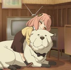 a person hugging a dog in front of a television set with an anime character on the screen