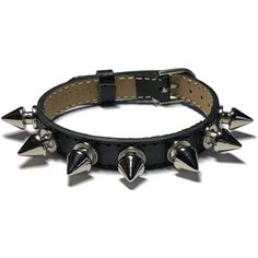 "10mm Spike Studded Leather Bracelet Wristband - Black Leather Spike Studded Wristband - Goth Wristband - Goth Leather Bracelet This black leather wristband is 10mm wide and about 8 inches long. It can fit a wrist from 5.5\" to 7.5\" around. The strap is made of Genuine leather and are stamped as such on the back. They are sewn around the edges for more durability. It has 7 Silver screw back Spike Studs evenly spaced across the center. The band is adjustable and has a nickel tone buckle closure Black Leather Choker, Gothic Chokers, Hemp Bracelets, Digital Closet, Leather Wristbands, Buckle Bracelet, 5 To 7, Leather Chokers, Black Choker