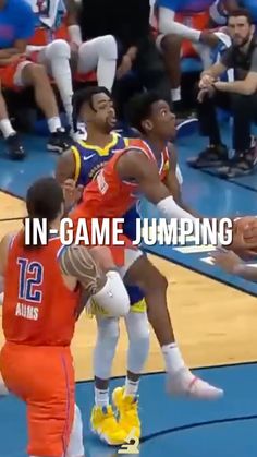 two basketball players in orange and blue uniforms are playing on the court with an audience watching