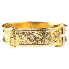 A stunning antique, Victorian era mourning ring. A rich 18ct yellow gold band with cut out panel sides featuring finely plaited brown hair. The gold band is engraved and terminates at the front with an elaborate buckle and belt design, this symbolises holding someone close and enhances the sentiment in this beautiful ring. The engraving includes tiny little forget me not flowers adding further symbolism to this beautiful memorial piece. An exceptionally well made ring, a real beauty with an unusual design. It has a personal inscription engraved on the inner band, partly worn, initials M. E. W in fancy script can be seen. Marks and era: Unmarked, Victorian era c1880s, electronically tests as 18ct gold. Condition: Good used condition overall, minor light surface wear commensurate with age an Luxury Vintage Memorial Ring, Initial M, Fancy Script, Vintage Fans, Belt Design, Unusual Design, Real Beauty, Beautiful Ring, Gold Band