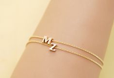 This is a 14K gold initial bracelet, it comes with a 14K round cable chain in 1mm thickness and initials of your choice. Depending on the letter, each initial is approximately 4-5 mm high and wide with 2.4 mm thickness. I make this bracelet in 14K yellow, 14K white and 14K rose gold, these options are available in a drop down menu, price is same for all colors. The high quality cable chain is nice and durable with tightly coiled loops. If you prefer thicker chains, send me a message and I will g Dainty Rose Gold Name Bracelet With Initials, 14k Rose Gold Bracelets With Initials, Yellow Gold Initials Name Bracelet As Gift, Yellow Gold Initials Name Bracelet For Gift, Yellow Gold Initials Name Bracelet Gift, 14k Gold Monogram Bracelets As A Gift, 14k Gold Monogram Name Bracelet As Gift, 14k Gold Monogram Name Bracelet For Gift, 14k Yellow Gold Bracelet With Initials