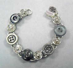 a close up of a bracelet with buttons on it