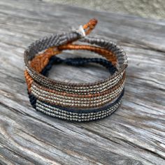 Hill Tribe silver beads braided woven bracelet with silver button closure an  adjustable size 7" - 8" Adjustable Woven Wrap Bracelet As Gift, Adjustable Woven Wrap Bracelet Gift, Adjustable Silver Bohemian Wrap Bracelet, Adjustable Silver Beads Friendship Bracelets, Adjustable Woven Jewelry, Adjustable Brown Jewelry With Silver Beads, Adjustable Brown Beaded Bracelets, Adjustable Beaded Wrap Bracelet For Friendship, Silver Beaded Wrap Bracelet For Festivals