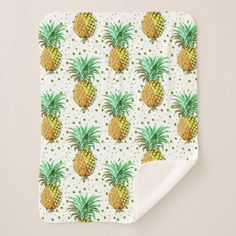 a blanket with pineapples on it