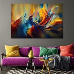 an abstract painting on the wall in a living room