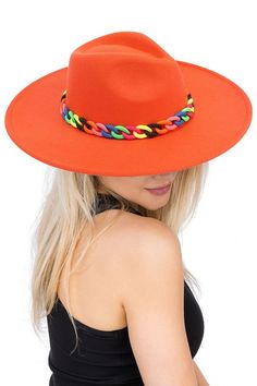 Accessorize any outfit with our most loved fashion fedora. Make heads turn in this gorge hat featuring a colorful Matte Rainbow Acrylic Resin Cuban Link Chain Decor. Wide Brim Felt Rancher Hat-Adjustable inner drawstring-Brim Size: 4"-Head Size: OS (About 57cm-58cm AKA M/L)Material Composition65% Cotton, 35% Polyester Trendy Flat Brim Sun Hat For Festival, Casual Summer Felt Hat, Trendy Summer Fedora Felt Hat, Casual Multicolor Fedora For Festivals, Casual Spring Party Hats, Adjustable Red Hat Bands For Spring, Trendy Brimmed Festival Hats, Trendy Brimmed Hats For Festivals, Trendy Summer Felt Hat With Curved Brim