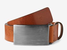 Italian craftsmanship is known for its attention to detail and quality of materials. This brown leather belt is a testament to that craftsmanship and a showpiece of Danish design. Leather Belt Buckles With Removable Belt For Everyday Use, Leather Belt Buckle With Removable Belt For Everyday Use, Modern Leather Business Belt, Adjustable Leather Belt Buckles With Leather Strap, Luxury Adjustable Leather Belt Buckles, Rectangular Leather Belt Buckles For Everyday Use, Brown Rectangular Belt For Everyday Use, Adjustable Leather Belt Buckles For Formal Wear, Adjustable Brown Leather Belt