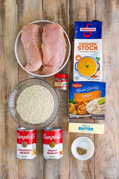 ingredients to make chicken stock laid out on a wooden table