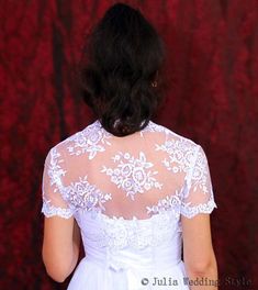 This amazing, gentle and very feminine and can become a special to your wedding dress ! It will compliment any dress, cocktail dress or evening gown. It will be perfect also for your bridesmaids.Made with beautiful lace and sequins.Available color white.This bolero measures approximately 12"-13" from the base of your neck down the center back.Bust 34"-35".Sleeve--8 inch.Care instructions: Hand wash, cold water, no bleach, rinse well and promptly remove.For best results, hand wash at a temperatur Fitted Lace Bridal Accessories For Mother Of The Bride, Lace Bridal Accessories Fitted For Mother Of The Bride, Lace Shrug With Lace Trim For Wedding, Elegant Lace Wedding Shrug, Wedding Shrug With Lace Sleeves, White Bolero Jacket, White Bolero, First Communion Veils, Communion Veils