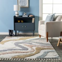 a living room with blue walls and white rugs on the floor next to a chair