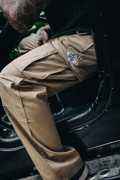 Tactical B.D.U. Pants. *Please tape measure your waist before ordering these! These are TRUE TO SIZE! Most jeans / pants manufacturers are 2 to 2.5 inches off. I wear 34 in jeans, yet my waist tapes 36.5 inches. These BDU Cargos are true to size* - 3.25 x 2 inch, 2 color, 7000 stitch side cargo pocket GRIND embroidery -Relaxed Fit -Cotton / Poly Twill -Zipper Fly -2 front slash pockets, 2 button down cargo pockets, 2 button down back pockets -Reinforced seat and knees -Drawstring bottoms -Adjust Combat Style Straight Leg Streetwear Bottoms, Streetwear Combat Bottoms With Straight Leg, Combat Style Straight Leg Bottoms For Streetwear, Combat Straight Leg Bottoms For Streetwear, Combat Style Straight Leg Pants For Streetwear, Straight Leg Combat Pants For Streetwear, Khaki Techwear Bottoms With Cargo Style, Combat Pants With Straight Leg And Hip Pockets, Urban Khaki Pants For Outdoor Activities