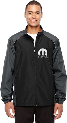 This men's MOPAR lightweight windbreaker jacket has been crafted for quality and comfort. It's styling was adapted to ensure the wearer of fashion and comfort. This men's lightweight hiking jacket is beautifully tailored with a wind resistant and water resistant shell made of 100% Nylon. Zip front jacket from bottom to collar top. Inside adjustable draw cord with cord lock at the bottom. Plenty of storage with 2 hand pockets with zippers for security Elastic sleeve cuffs. Partial inside placket Mustang Jacket, Masculine Shirts, Mustang T Shirts, Twill Coat, Corvette C7, Water Resistant Jacket, Heavy Jacket, Hiking Jacket, Navy Jacket