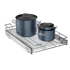 two pots and pans sitting on top of a metal rack