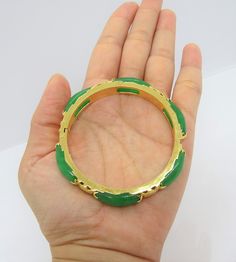 Vintage 18K Solid Yellow Gold Translucent Green Jadeite Jade & White Topaz Bamboo Bangle Bracelet ....Marked 18K...Total of weights 30.8grams...Measure inside 53MM W 8.1MM...With 06 Green Jades 21.5 x 7.5MM ...It's in very good condition. #475680 Green Jade Bracelet For Wedding, Jade Bracelet For Wedding, Green Gemstone Bangle For Anniversary, Green Bangle Jewelry For Anniversary, Green Bangle Bracelet For Anniversary, Green Bangle Bracelets For Anniversary, Green Bangle For Anniversary, Anniversary Green Gemstone Bangle, Bamboo Bangle