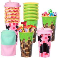 a bunch of cups that are sitting next to each other