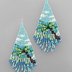 two pairs of beaded earrings with blue and green beads on the bottom, one is shaped